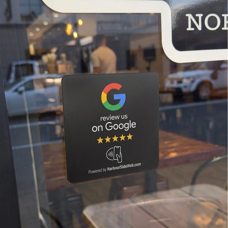 Google Review card on a cafe counter